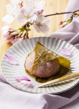 Rice cake with bean paste wrapped in a preserved cherry leaf Stock Photos