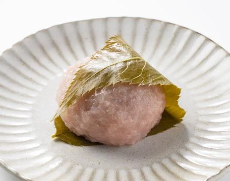 Rice cake with bean paste wrapped in a preserved cherry leaf Stock Photos