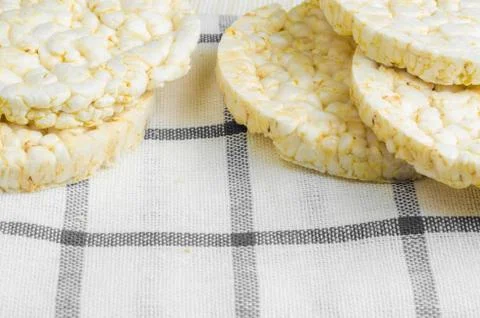 Rice cake, puffed rice on table cloth.. Stock Photos