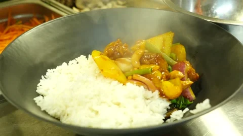 Rice with chicken and vegetables Stock Footage 40697937