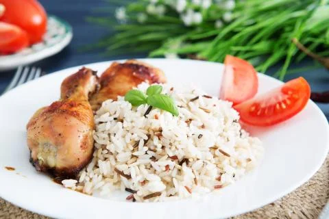 Rice with chicken on a serving gray table Stock-Fotos