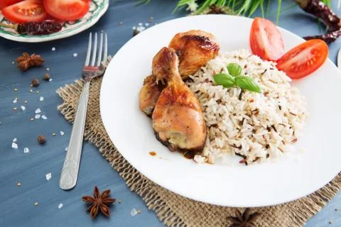 Rice with chicken on a serving gray table Stock-Fotos