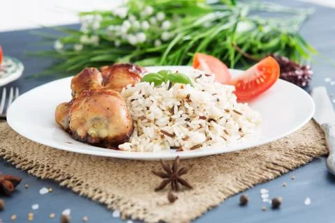 Rice with chicken on a serving gray table Stock-Fotos