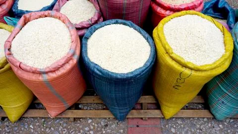 Rice in colorful pastel sack Stock Photos