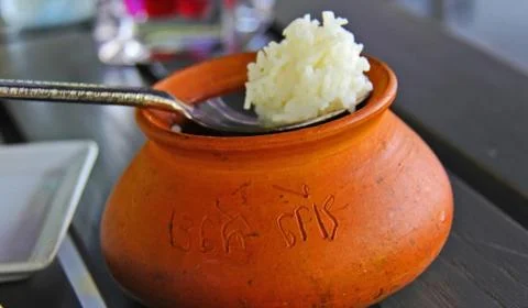 Rice cooked in a pot. Stock Photos
