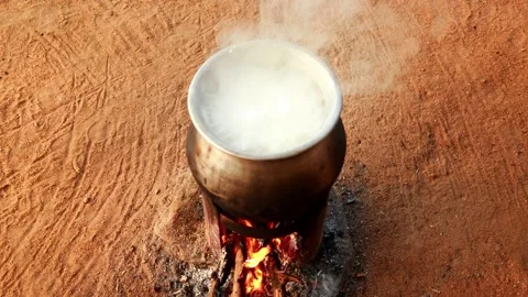 Rice Cooking Using Firewood Stock Footage 248880502