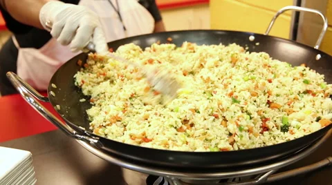 Rice Cooking in Wok Stock Footage 57672510