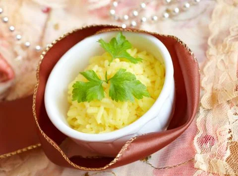 Rice with curcuma Stock Photos
