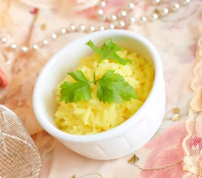 Rice with curcuma Stock Photos