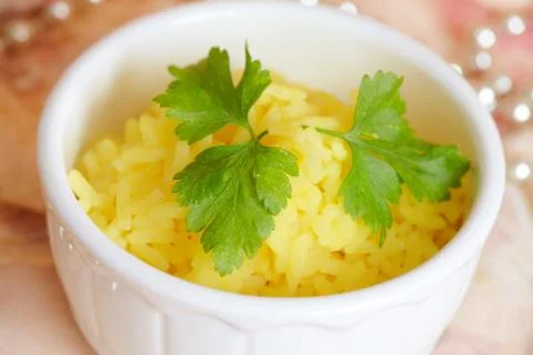 Rice with curcuma Stock Photos