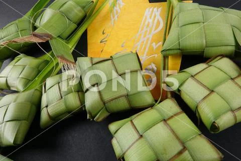 Rice dumpling and money packet decoration for Eid Mubarak celebration. Stock Photos