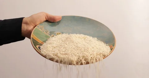 Rice falling from plate Video stock 97488374