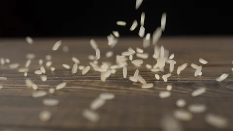 Rice falling in slow motion. Starch and carbohydrates. Stock Footage 110910365