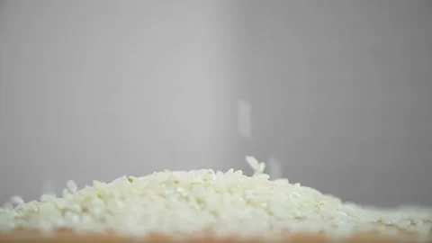 Rice falls on a cutting board Stock Footage 195112110