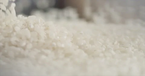 Rice falls on a hill of rice Stock Footage 199023919