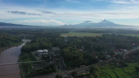 Rice Field with Merapi Mountain View in the morning Stock Footage 233785744