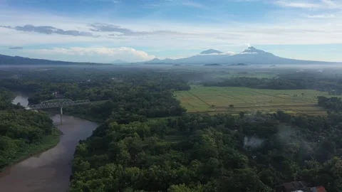 Rice Field with Merapi Mountain View in the morning Stock Footage 233785755