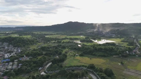 Rice Fields and a factory Video stock 324828614