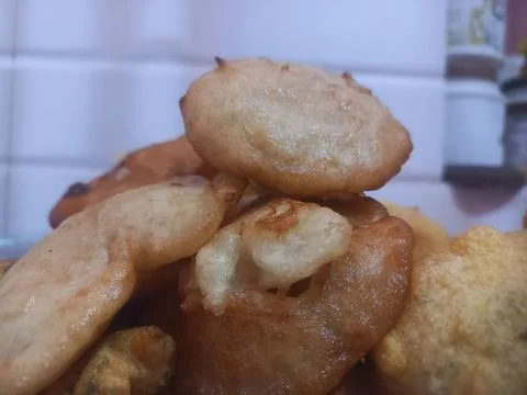 Rice flour jaggery dumpling is kept in plate. Sweet Pitha Stock Photos