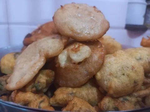Rice flour jaggery dumpling is kept in plate. Sweet Pitha Stock Photos