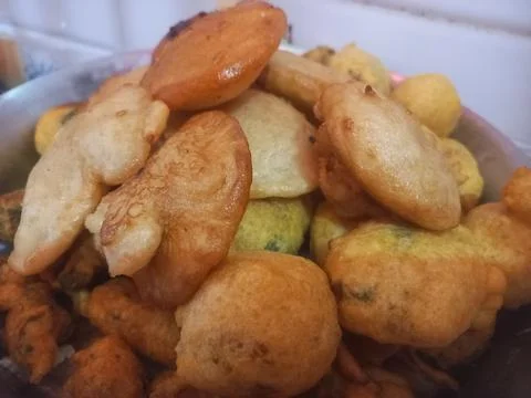 Rice flour jaggery dumpling is kept in plate. Sweet Pitha Stock Photos