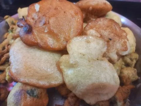 Rice flour jaggery dumpling is kept in plate. Sweet Pitha Stock Photos