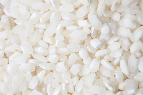Rice grains background Stock Photos