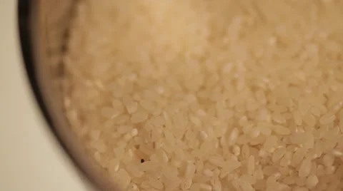 Rice grains fall into the pan. Stock Footage 22244772
