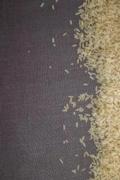 Rice on gray background Stock Photos