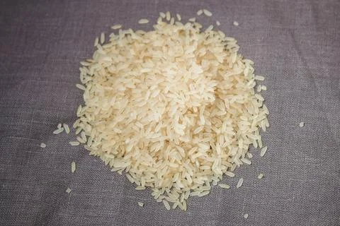 Rice on gray background Stock Photos