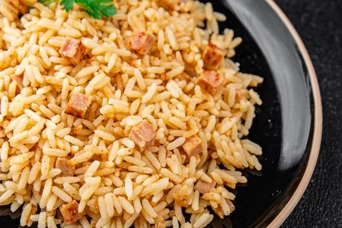 Rice with ham meat main course delicious fresh delicious gourmet food backg.. Stock Photos
