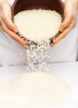 Rice in the hands Stock Photos