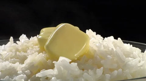 Rice with knobs of butter Stock Footage 8574007