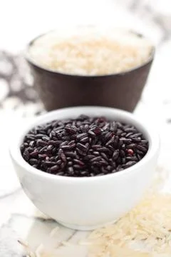 Rice on marble table. Stock Photos