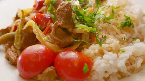 Rice, meat and vegetables ready for dinner Stock Footage 165527820