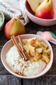 Rice pudding with apple compote Stock Photos