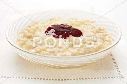 Rice pudding with jam Stock Photos