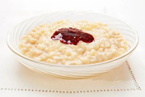 Rice pudding with jam Stock Photos