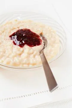 Rice pudding with jam Stock Photos