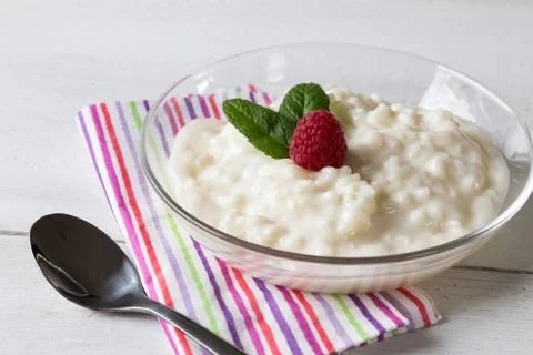 Rice pudding with mint and raspberry 스톡 사진