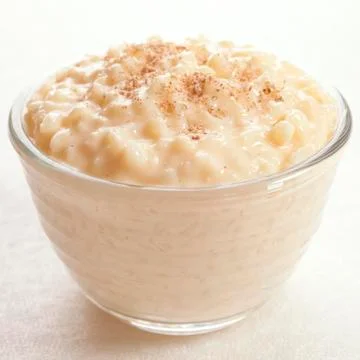 Rice pudding with nutmeg Stock Photos