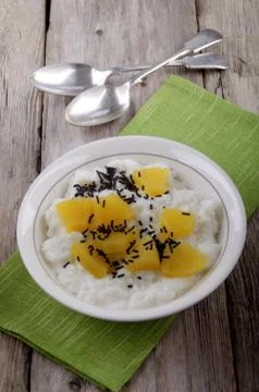 Rice pudding with pineapple in a bowl Stock Photos
