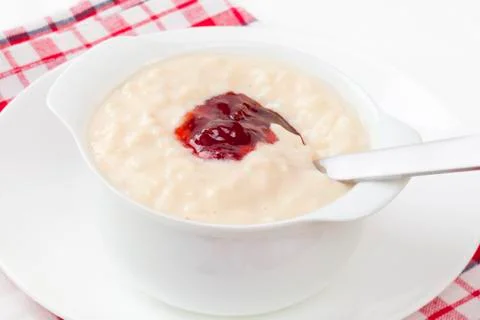 Rice pudding with strawberry jam Stock Photos