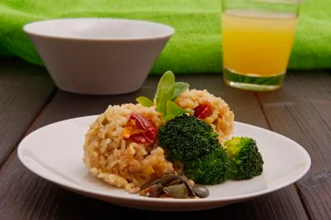 Rice risotto with vegetables on a table Stock-Fotos