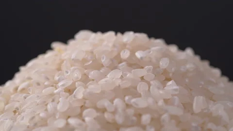 Rice rotate on black background, Close up of Japanese rice Stock Footage 139845139