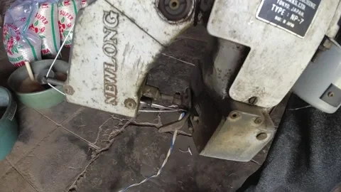 Rice sack sewing machine Stock Footage 250173803
