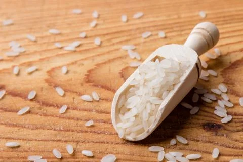 Rice with scoop Stock Photos