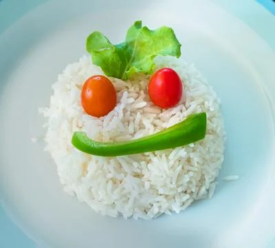 Rice shaped as a face Stock Photos