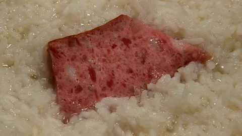 Rice with sliced sausage Stock Footage 312379252