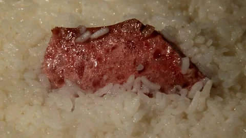 Rice with sliced sausage 動画素材 312379610